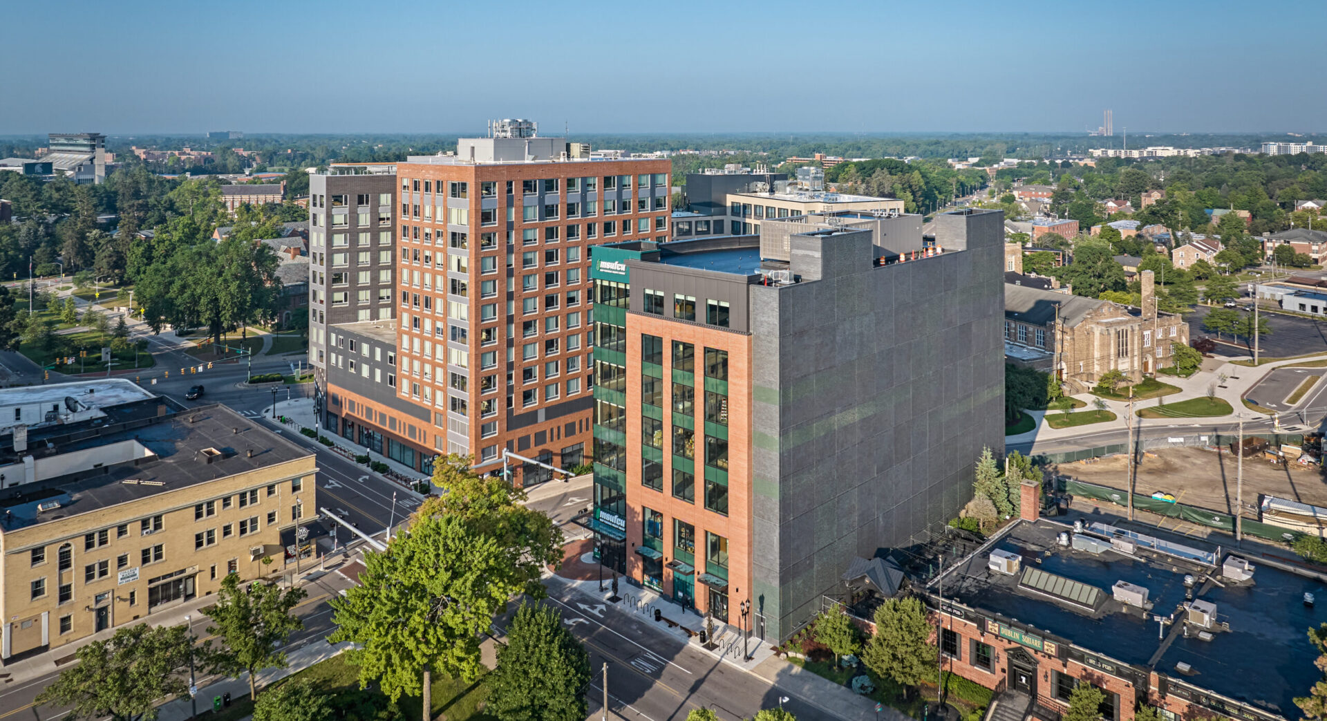 aerial view of the 311 abbot building across the street from the graduate hotel in east lansing michigan