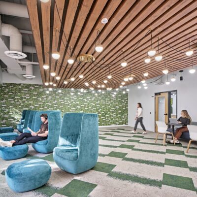 wellness room with soft seating and ceiling feature